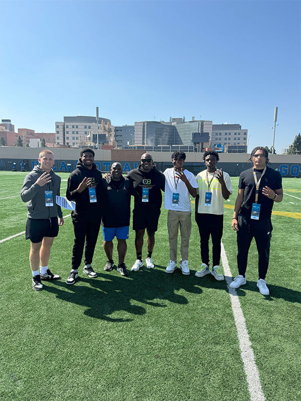 Coach with students